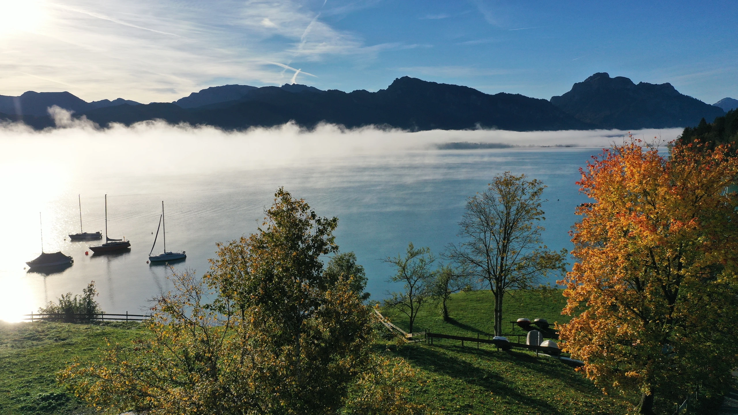 Lake Forggensee in autumn with mountains